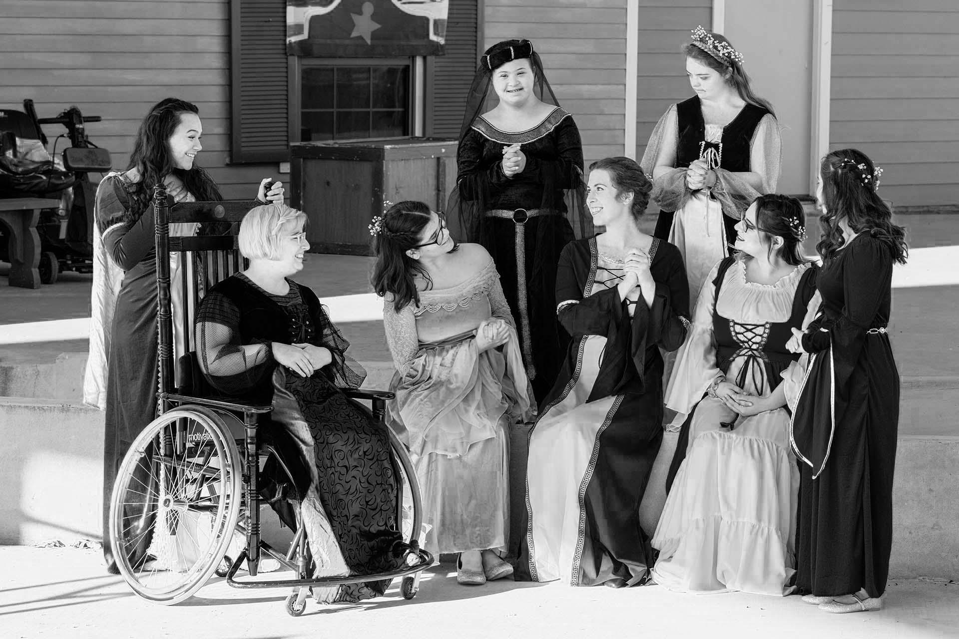 group of actors on stage in a Shakespeare play